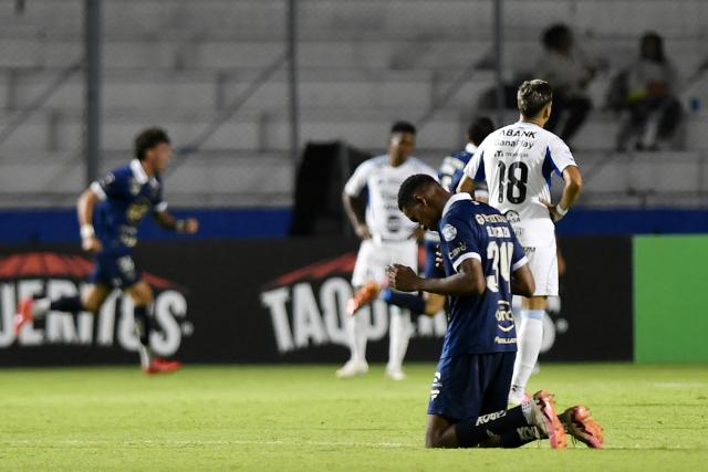 Motagua's defender #34 Giancarlo Sacaza reacts after teammate midfielder #23 Alejandro Reyes (out of frame) scores his team's third goal  during the first-leg quarterfinal football match of the Concacaf Central American Cup between Honduras' Motagua and El Salvador's Alianza FC at the Chelato Ucles National Stadium in Tegucigalpa on September 9, 2026. (Photo by Orlando SIERRA / AFP)