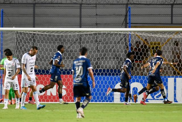 Motagua's midfielder #23 Alejandro Reyes (R) celebrates with teammates scoring his team's third goal during the first-leg quarterfinal football match of the Concacaf Central American Cup between Honduras' Motagua and El Salvador's Alianza FC at the Chelato Ucles National Stadium in Tegucigalpa on September 9, 2026. (Photo by Orlando SIERRA / AFP)