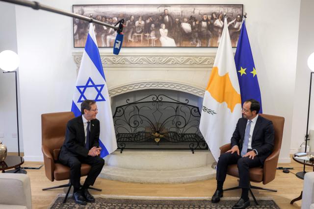 Cyprus' President Nikos Christodoulides (R) receives Israel's President Isaac Herzog (L) at the Presidential Palace in Nicosia on September 10, 2026. (Photo by Yiannis Kourtoglou / POOL / AFP)