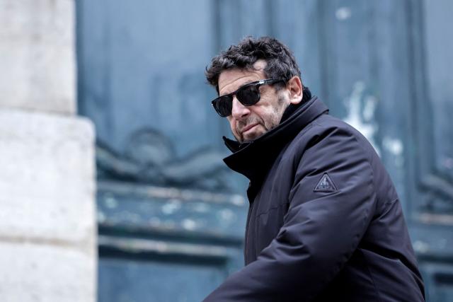 (FILES) French actor and singer Patrick Bruel arrives to attend the funeral ceremony of French-Danish actor Niels Arestrup outside the Church of Saint-Roch in Paris, on December 10, 2024. Bruel’s lawyers filed a complaint on September 9, 2026, specifically alleging a breach of the confidentiality of the investigation, condemning the publication by several media outlets, including *Paris Match*, of extracts from his interview with investigators, they told AFP on Thursday. (Photo by STEPHANE DE SAKUTIN / AFP)
