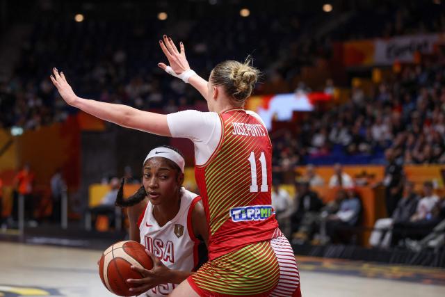 Hungary's center #11 Kinga Josepovits (R) attempts to block USA's forward #15 Angel Reese during the 2026 FIBA Women's Basketball World Cup quarter-final match between USA and Hungary at the Berlin Arena in Berlin on September 10, 2026. (Photo by Ronny HARTMANN / AFP)