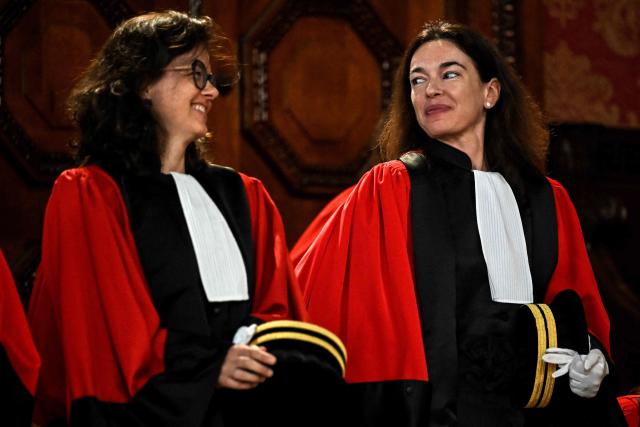 Newly-appointed magistrate at the Office of the Attorney General of the Court of Appeal of Bordeaux Clemence Meyer (R) attends the installation ceremony, in Bordeaux, in southwestern France, on September 10, 2026. (Photo by Christophe ARCHAMBAULT / AFP)
