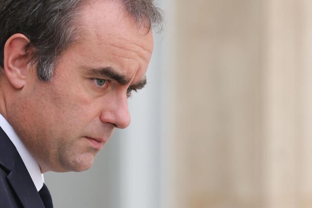 France's Prime Minister Sebastien Lecornu leaves after the weekly cabinet meeting at the Elysee Palace in Paris on September 10, 2026. (Photo by Ludovic MARIN / AFP)