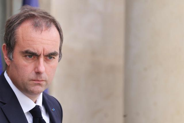 France's Prime Minister Sebastien Lecornu leaves after the weekly cabinet meeting at the Elysee Palace in Paris on September 10, 2026. (Photo by Ludovic MARIN / AFP)