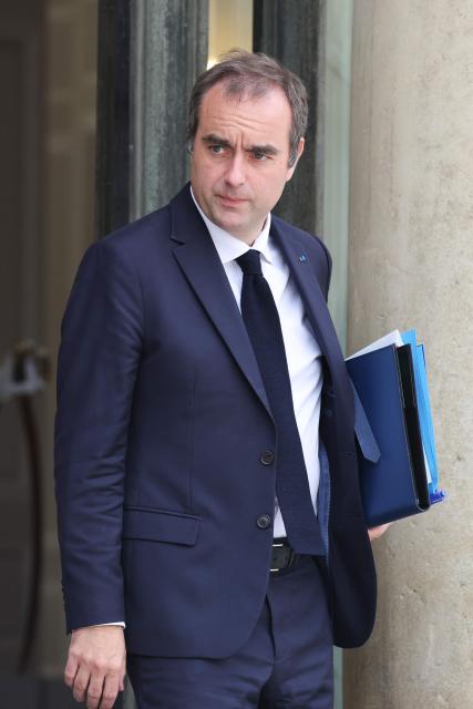 France's Prime Minister Sebastien Lecornu leaves after the weekly cabinet meeting at the Elysee Palace in Paris on September 10, 2026. (Photo by Ludovic MARIN / AFP)