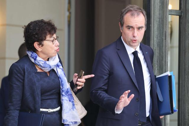 France's Environment Minister Monique Barbut (L) and France's Prime Minister Sebastien Lecornu discuss as they leave after the weekly cabinet meeting at the Elysee Palace in Paris on September 10, 2026. (Photo by Ludovic MARIN / AFP)