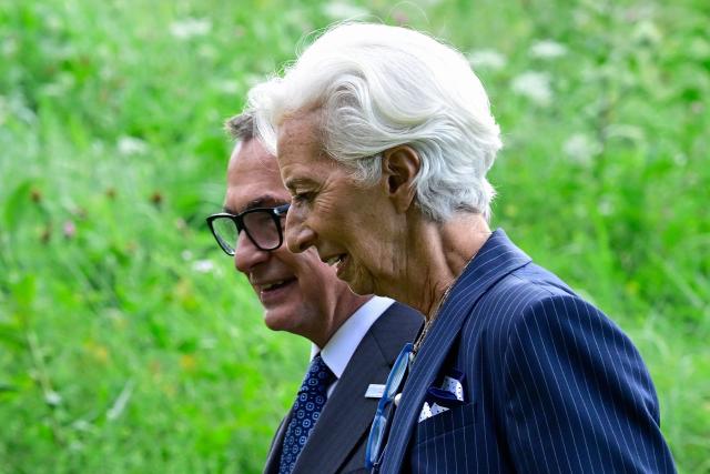 European Central Bank (ECB) President Christine Lagarde (R) chats with the German Central Bank's (Deutsche Bundesbank) President and member of the Governing Council of the ECB Joachim Nagel as they leave  after a meeting of the Governing Council of the European Central Bank (ECB) in Berlin on September 10, 2026. The European Central Bank on September 10, 2026 lifted its growth projections for this year and next as the eurozone economy withstands the Iran war energy shock better than feared. (Photo by John MACDOUGALL / AFP)