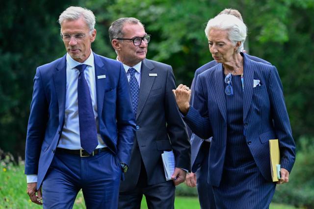 European Central Bank (ECB) President Christine Lagarde (R) chats with the German Central Bank's (Deutsche Bundesbank) President and member of the Governing Council of the ECB Joachim Nagel (C) and ECB Vice-President Boris Vujcic (L) as they leave  after a meeting of the Governing Council of the European Central Bank (ECB) in Berlin on September 10, 2026. The European Central Bank on September 10, 2026 lifted its growth projections for this year and next as the eurozone economy withstands the Iran war energy shock better than feared. (Photo by John MACDOUGALL / AFP)
