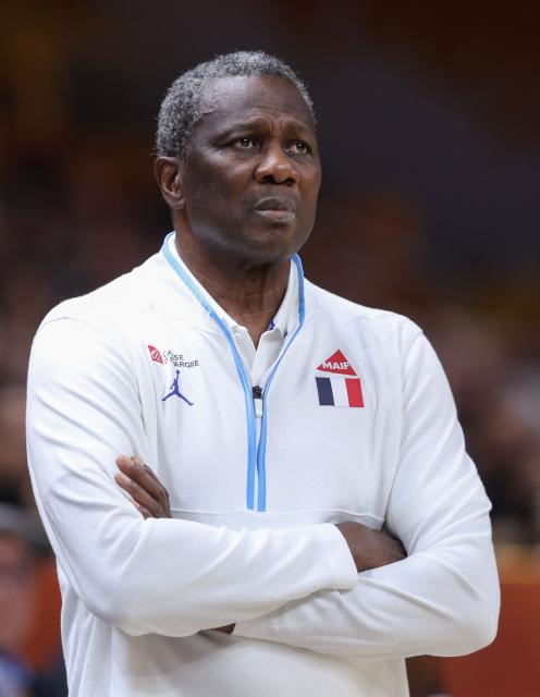 France's head coach Jean-Aime Toupane follows the action from the sidelines during the 2026 FIBA Women's Basketball World Cup quarter-final match between China and France at the Berlin Arena in Berlin on September 10, 2026. (Photo by Ronny HARTMANN / AFP)