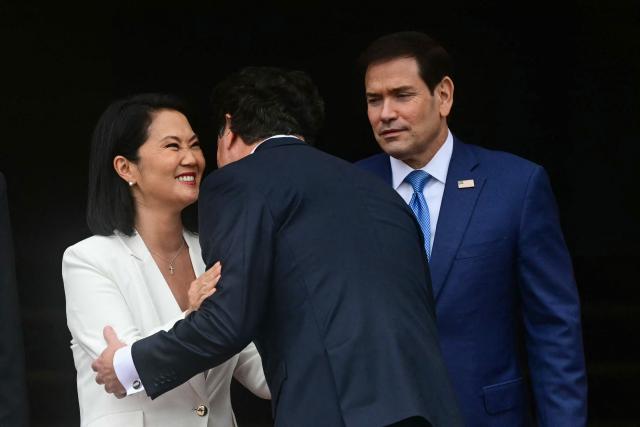 US Secretary of State Marco Rubio (R) is welcomed by Peruvian President Keiko Fujimori and United States Ambassador Bernie Navarro to Peru, at the Government Palace in Lima, on September 10, 2026.  (Photo by ERNESTO BENAVIDES / AFP)