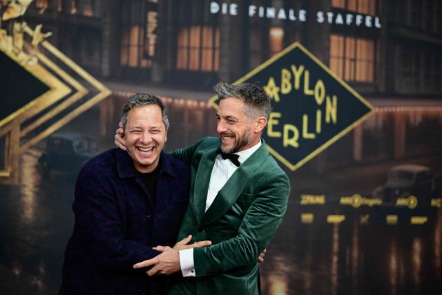 German actor Trystan Puetter and German actor Volker Bruch (R) pose on the red carpet upon arrival for the premiere of the 'Babylon Berlin' tv series' last season at the Zoopalast cinema in Berlin, on September 10, 2026. The lavishly produced, big-budget ARD series is set against the backdrop of Hitler’s rise to power. (Photo by Tobias SCHWARZ / AFP)