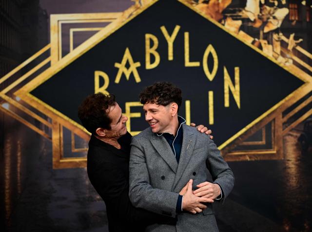 German film director and screenwriter Tom Tykwer and German actor Christian Friedel pose on the red carpet for the TV Hit Babylon Berlin last season at the Zoopalast cinema in Berlin, on September 10, 2026. The lavishly produced, big-budget ARD series is set against the backdrop of Hitler’s rise to power. (Photo by Tobias SCHWARZ / AFP)