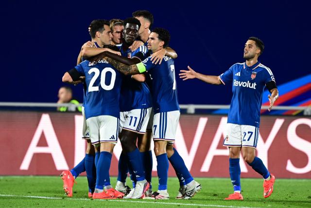 Teammates celebrate after Como's Greek striker #09 Anastasios Douvikas scores his team's second goal during the UEFA Champions League, league phase, matchday 1, football match between Como 1907 and RB Leipzig at the Giuseppe Sinigaglia stadium in Como, on September 10, 2026. (Photo by PIERO CRUCIATTI / AFP)