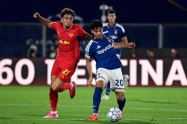 Leipzig's Morrocan midfielder #21 Neil El Aynaoui fights for the ball with Como's Croatian midfielder #20 Martin Baturina during the UEFA Champions League, league phase, matchday 1, football match between Como 1907 and RB Leipzig at the Giuseppe Sinigaglia stadium in Como, on September 10, 2026. (Photo by PIERO CRUCIATTI / AFP)