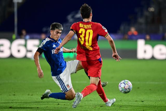 Leipzig's French defender #03 Maxime Esteve fights for the ball with Leipzig's Serbian midfielder #30 Andrija Maksimovic during the UEFA Champions League, league phase, matchday 1, football match between Como 1907 and RB Leipzig at the Giuseppe Sinigaglia stadium in Como, on September 10, 2026. (Photo by PIERO CRUCIATTI / AFP)