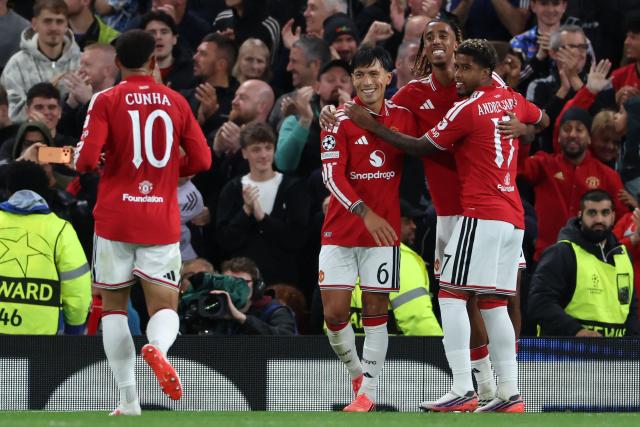 Manchester United's Argentinian defender #06 Lisandro Martinez (C) celebrates scoring the team's fourth goal during the UEFA Champions League football match between Manchester United and Sabah FK at Old Trafford in Manchester, north west England, on September 10, 2026. (Photo by Darren Staples / AFP)
