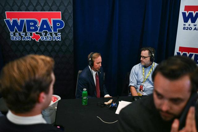 Texas Attorney General Ken Paxton, candidate for US Senate, participates in a radio interview during the second day of the Republican National Committee midterm convention at the American Airlines Center in Dallas, Texas on September 10, 2026. US Republicans are betting that putting President Donald Trump at the center of their campaign can rescue a party facing grim election forecasts, despite the president's negative approval ratings. A day earlier, on the first day of the midterm convention, he promised $5,000 to every American adult if Republicans retain control of Congress in November. (Photo by Kent NISHIMURA / AFP)