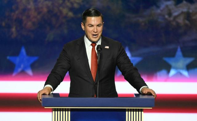 Eric Flores, Republican Candidate for US House of Representatives in Texas, speaks during the second day of the Republican National Committee midterm convention at the American Airlines Center in Dallas, Texas on September 10, 2026. US Republicans are betting that putting President Donald Trump at the center of their campaign can rescue a party facing grim election forecasts, despite the president's negative approval ratings. A day earlier, on the first day of the midterm convention, he promised $5,000 to every American adult if Republicans retain control of Congress in November. (Photo by Patrick T. Fallon / AFP)
