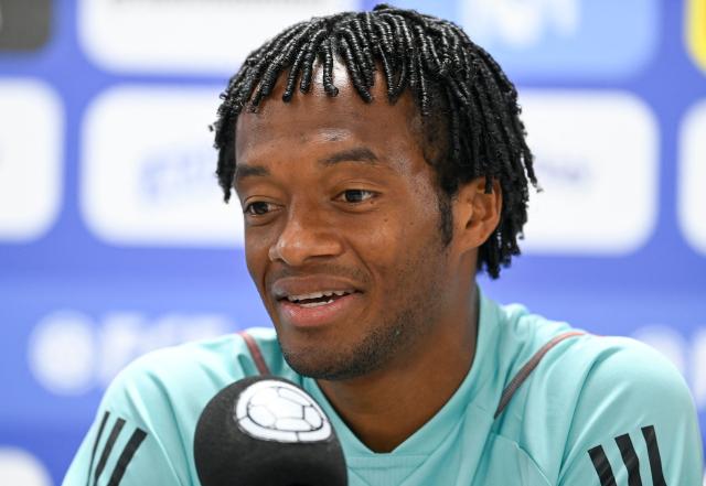 (FILES) Colombia's midfielder Juan Guillermo Cuadrado speaks during a press conference at the Metropolitano Roberto Melendez stadium in Barranquilla, Colombia, on September 6, 2023, on the eve of their 2026 FIFA World Cup Qualifier football match against Venezuela. Colombian football player Juan Guillermo Cuadrado, who represented Colombia at the 2014 FIFA World Cup in Brazil and the 2018 FIFA World Cup in Russia, signed with Bogota-based club Millonarios on September 10, 2026. (Photo by Juan BARRETO / AFP)