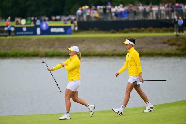 Team Europe’s Swedish golfer Maja Stark (L) and Team Europe’s Swedish golfer Linn Grant walk together during play in their fourball match against US Team players on the second day of the 2026 Solheim Cup biennial team golf competition on The Bernardus Golf Course at Cromvoirt, some 80kms south-east of Rotterdam on September 12, 2026. (Photo by NICOLAS TUCAT / AFP)