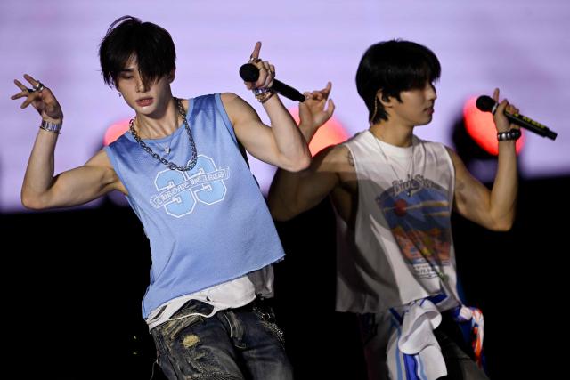 South Korean K-pop group Stray Kids members Hyunjin (L) and Han perform during the last week of the Rock in Rio music festival at the Rio 2016 Olympic Park in Rio de Janeiro, Brazil, on September 12, 2026. (Photo by MAURO PIMENTEL / AFP)