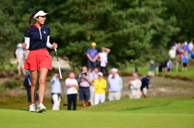 US teams golfer Yealimi Noh celebrates on a green after making a putt during play in her fourball match against Team Europe players on the second day of the 2026 Solheim Cup biennial team golf competition on The Bernardus Golf Course at Cromvoirt, some 80kms south-east of Rotterdam on September 12, 2026. (Photo by NICOLAS TUCAT / AFP)