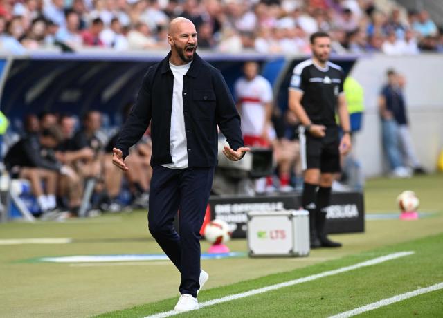 Hoffenheim's Austrian head coach Christian Ilzer reacts during the German first division Bundesliga football match between Hoffenheim and VfB Stuttgart in Sinsheim on September 12, 2026. (Photo by THOMAS KIENZLE / AFP) / DFL REGULATIONS PROHIBIT ANY USE OF PHOTOGRAPHS AS IMAGE SEQUENCES AND/OR QUASI-VIDEO