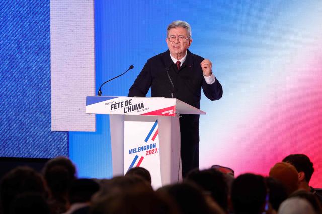 Supporters cheer as the image of French left-wing party La France Insoumise (LFI) founder and candidate in France’s 2027 presidential election Jean-Luc Melenchon is displayed on a screen prior to LFI speeches during the annual "Fete de l'Humanite" festival organised by French left wing newspaper L'Humanite, in Le Plessis-Pate, south of Paris, on September 12, 2026. (Photo by GEOFFROY VAN DER HASSELT / AFP)