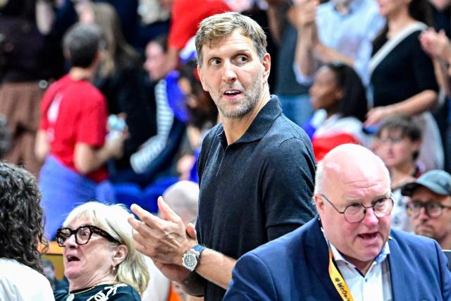 German former NBA basketball player Dirk Nowitzki looks on prior to the start of the 2026 FIBA Women's Basketball World Cup semi-final match between France and Germany in Berlin on September 12, 2026. (Photo by Tobias SCHWARZ / AFP)