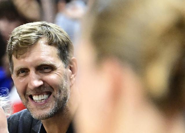 German former NBA basketball player Dirk Nowitzki reacts prior to the start of the 2026 FIBA Women's Basketball World Cup semi-final match between France and Germany in Berlin on September 12, 2026. (Photo by Tobias SCHWARZ / AFP)