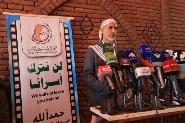 Mohammed Ahmed Miftah (C), the Houthi authorities' caretaker prime minister, holds a press conference in the Yemeni capital Sanaa on September 12, 2026, after prisoners loyal to the authority were released on the west coast where they were being held by Yemen's Saudi-backed government forces. Some 210 prisoners were released following a week-long offensive, in which the Iran-backed Houthis on September 11, 2026, captured Yemen's Red Sea coast from the internationally recognised government, cementing their hold on the Bab al-Mandab Strait, a vital artery for Saudi Arabian oil exports as the Strait of Hormuz remains closed amid the US-Iran war. (Photo by Mohammed HUWAIS / AFP)