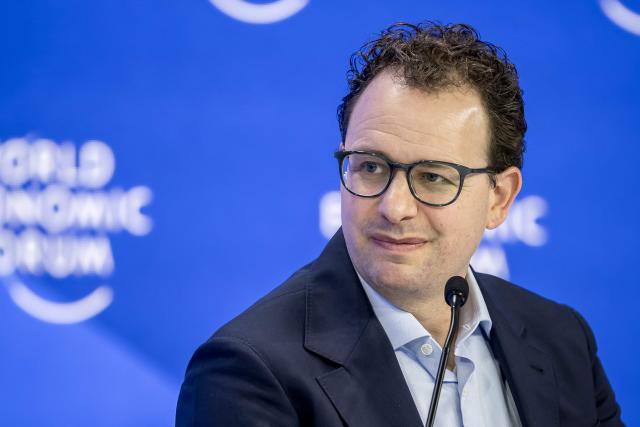 (FILES) Anthropic CEO Dario Amodei looks on as he takes part in a session on AI during the World Economic Forum (WEF) annual meeting in Davos on January 23, 2025. Anthropic CEO Dario Amodei on September 12, 2026, called on artificial intelligence (AI) firms to slow down the development of the powerful technology, amid mounting worries over the risks of "superintelligent" computer systems. His comments came a few days after AI researcher Jacob Coxon, who left OpenAI to join Anthropic, decided to leave the industry, accusing both US companies of "gambling with our lives" in the race to develop models capable of self-improvement. (Photo by FABRICE COFFRINI / AFP)