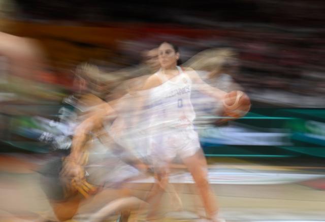 France's point guard #0 Carla Leite plays the ball during the 2026 FIBA Women's Basketball World Cup semi-final match between France and Germany in Berlin on September 12, 2026. (Photo by Tobias SCHWARZ / AFP)