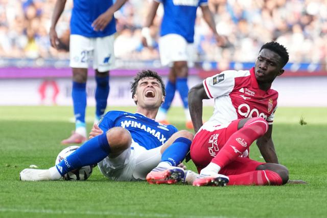 Strasbourg’s US midfielder #10 Giovanni Reyna (L) is tackled by Monaco’s Senegalese midfielder #08 Lamine Camara during the French L1 football match between RC Strasbourg Alsace and AS Monaco at the Stade de la Meinau in Strasbourg, eastern France, on September 12, 2026. (Photo by SEBASTIEN BOZON / AFP)