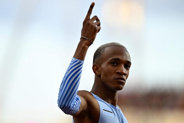 Botswana's Busang Collen Kebinatshipi celebrates his victory in the men's 400m final during the World Athletics Ultimate Championship at the Gyula Zsivotzky National Athletics Centre, in Budapest on September 12, 2026. (Photo by Jewel SAMAD / AFP)