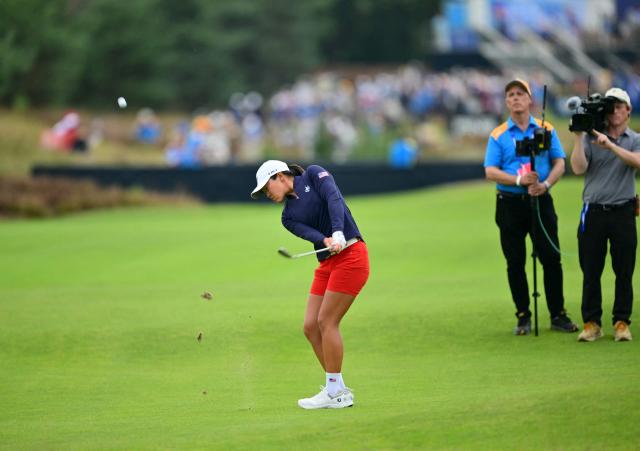 US teams golfer Auston Kim hits a fairway shot during play in her fourball match against Team Europe players on the second day of the 2026 Solheim Cup biennial team golf competition on The Bernardus Golf Course at Cromvoirt, some 80kms south-east of Rotterdam on September 12, 2026. (Photo by NICOLAS TUCAT / AFP)