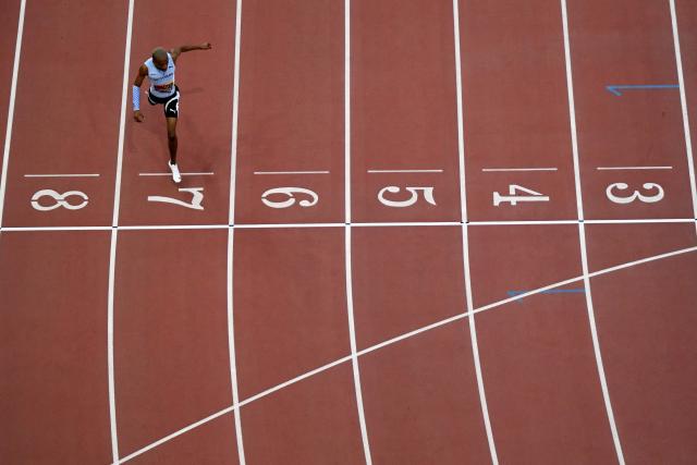 Botswana's Busang Collen Kebinatshipi approaches the finish line to win the men's 400m final during the World Athletics Ultimate Championship at the Gyula Zsivotzky National Athletics Centre, in Budapest on September 12, 2026. (Photo by Jewel SAMAD / AFP)