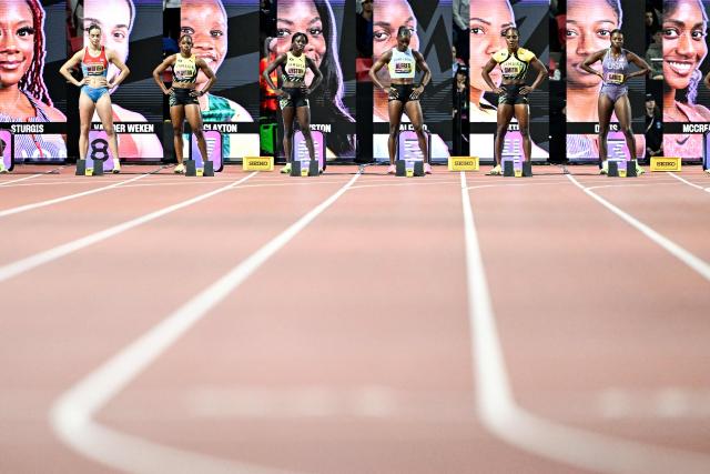 Athletes prepare to start in the women's 100m semi-final heat 2 during the World Athletics Ultimate Championship at the Gyula Zsivotzky National Athletics Centre, in Budapest on September 12, 2026. (Photo by Jewel SAMAD / AFP)
