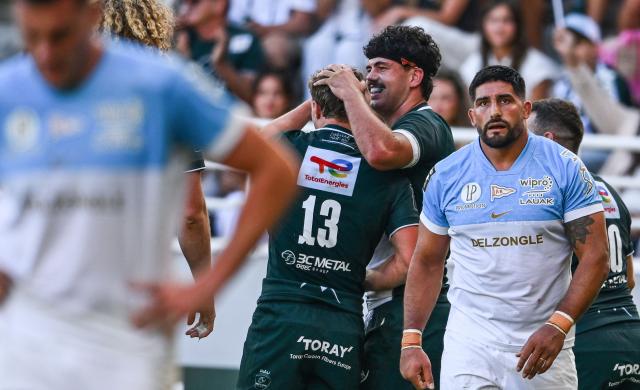 Pau's French lock Hugo Auradou (C) celebrates after scoring a try during the French Top 14 rugby union match between Section Paloise and Aviron Bayonnais at Stade du Hameau in Pau on September 12, 2026. (Photo by Gaizka IROZ / AFP)