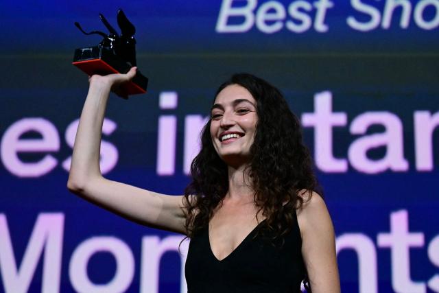 Shaden Safieddine Tazi receives the Orizzonti Award for Best Short film for "Quelques instants de bonheur" (A few moments of hapiness) during the closing ceremony of the 63rd Venice Film Festival at Venice Lido on September 12, 2026. (Photo by Stefano Rellandini / AFP)