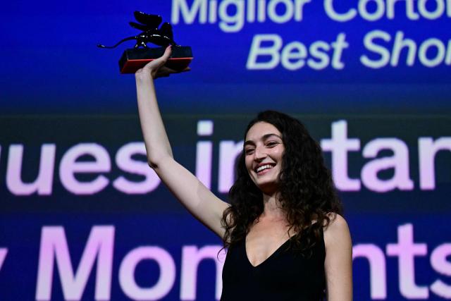 Shaden Safieddine Tazi receives the Orizzonti Award for Best Short film for "Quelques instants de bonheur" (A few moments of hapiness) during the closing ceremony of the 63rd Venice Film Festival at Venice Lido on September 12, 2026. (Photo by Stefano Rellandini / AFP)