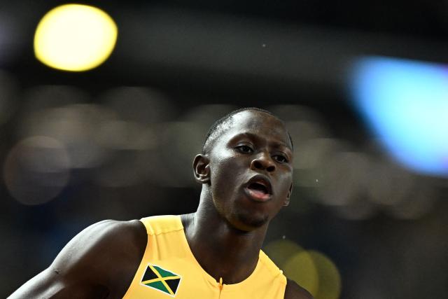 Jamaica's Oblique Seville competes in the men's 100m semi-final heat 1 during the World Athletics Ultimate Championship at the Gyula Zsivotzky National Athletics Centre, in Budapest on September 12, 2026. (Photo by Jewel SAMAD / AFP)