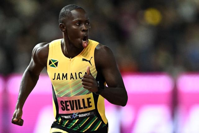 Jamaica's Oblique Seville competes in the men's 100m semi-final heat 1 during the World Athletics Ultimate Championship at the Gyula Zsivotzky National Athletics Centre, in Budapest on September 12, 2026. (Photo by Jewel SAMAD / AFP)