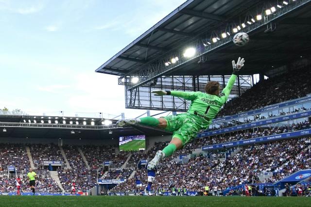 Strasbourg’s Danish goalkeeper #01 Filip Jorgensen dives a concedes a goal by Monaco’s German forward #29 Paris Brunner during the French L1 football match between RC Strasbourg Alsace and AS Monaco at the Stade de la Meinau in Strasbourg, eastern France, on September 12, 2026. (Photo by SEBASTIEN BOZON / AFP)