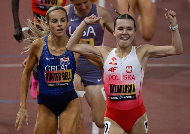 Poland's Klaudia Kazimierska (R) wins ahead of Britain's Georgia Hunter Bell in the women'sPoland's Klaudia Kazimierska 1500m final during the World Athletics Ultimate Championship at the Gyula Zsivotzky National Athletics Centre, in Budapest on September 12, 2026. (Photo by Attila KISBENEDEK / AFP)