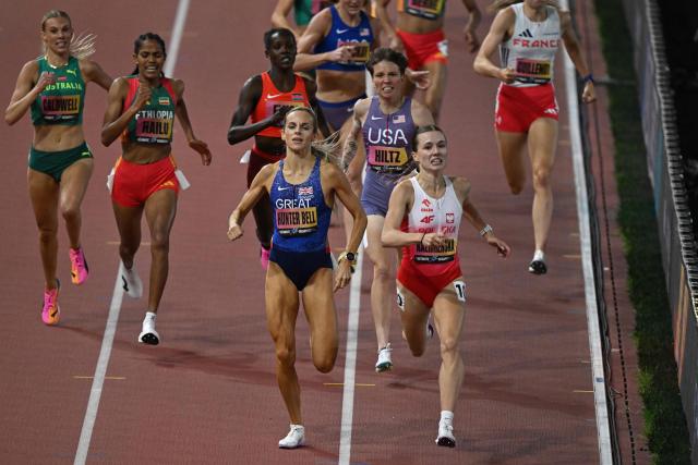 Poland's Klaudia Kazimierska (R) wins ahead of Britain's Georgia Bell in the women'sPoland's Klaudia Kazimierska 1500m final during the World Athletics Ultimate Championship at the Gyula Zsivotzky National Athletics Centre, in Budapest on September 12, 2026. (Photo by Attila KISBENEDEK / AFP)