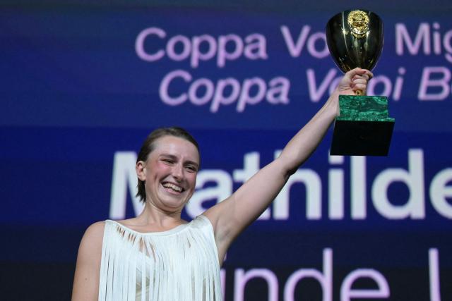Danish actress Mathilde Arcel receives the Coppa Volpi for Best Actress she received for her part in "Woman Unknown" during the closing ceremony of the 63rd Venice Film Festival at Venice Lido on September 12, 2026. (Photo by Stefano Rellandini / AFP)