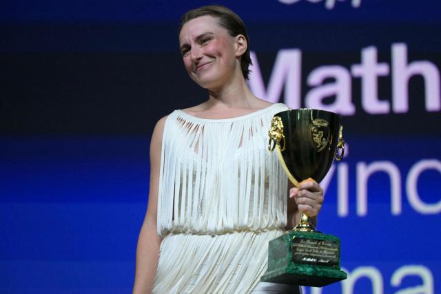 Danish actress Mathilde Arcel receives the Coppa Volpi for Best Actress she received for her part in "Woman Unknown" during the closing ceremony of the 63rd Venice Film Festival at Venice Lido on September 12, 2026. (Photo by Stefano Rellandini / AFP)