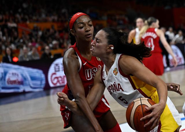 USA's forward #15 Angel Reese (L) and Spain's point guard #05 Maite Cazorla vie for the ball during the 2026 FIBA Women's Basketball World Cup semi-final match between Spain and the United States in Berlin on September 12, 2026. (Photo by Tobias SCHWARZ / AFP)