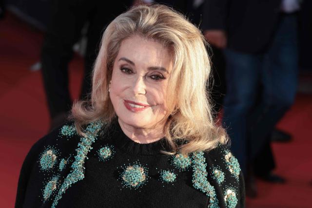 French actress Catherine Deneuve poses on the red carpet during the 52nd edition of the Deauville American film festival, in Deauville, northwestern France on September 12, 2026. (Photo by Alain JOCARD / AFP)